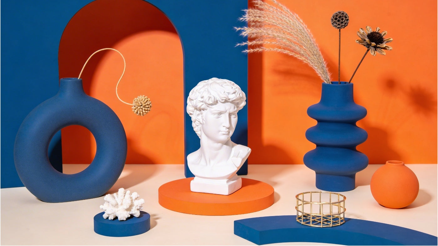 Decorative accents including vases and decor pieces displayed in a clean modern arrangement